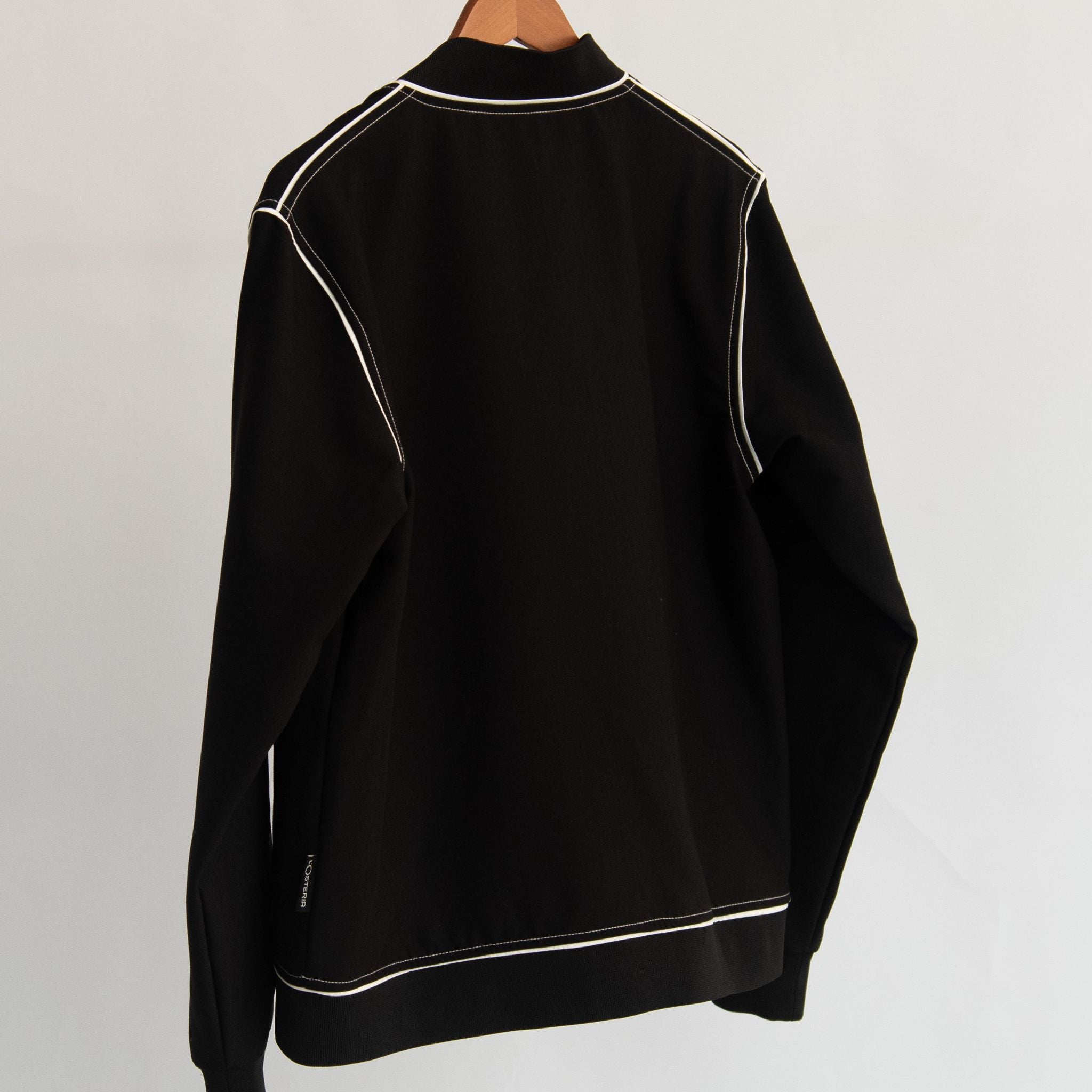 Die schwarze Wende-Bomberjacke mit allover-print aus der Pizza Kollektion der L'Osteria