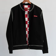 Die schwarze Wende-Bomberjacke mit allover-print aus der Pizza Kollektion der L'Osteria
